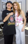 Carlos Santana and Celine Dion during Super Bowl XXXVII – Backstage at Qualcomm Stadium in San Diego, California, United States. ***Exclusive*** (Photo by KMazur/WireImage)