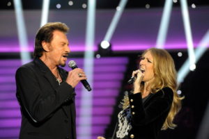 Céline Dion and Johnny Hallyday performing "L'amour peut prendre froid" (© Photo Collaboration spéciale, Marc CHAUMEIL)
